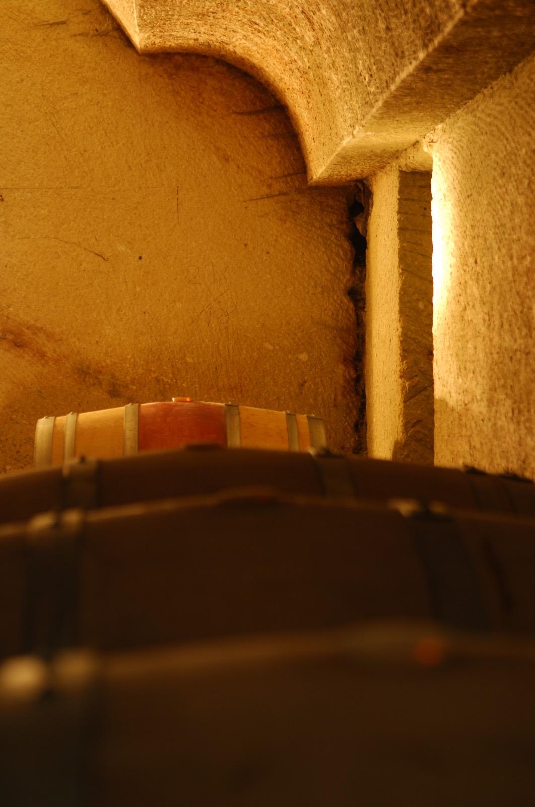 Close-up of the tuff wall of the cellar, showing carving marks.